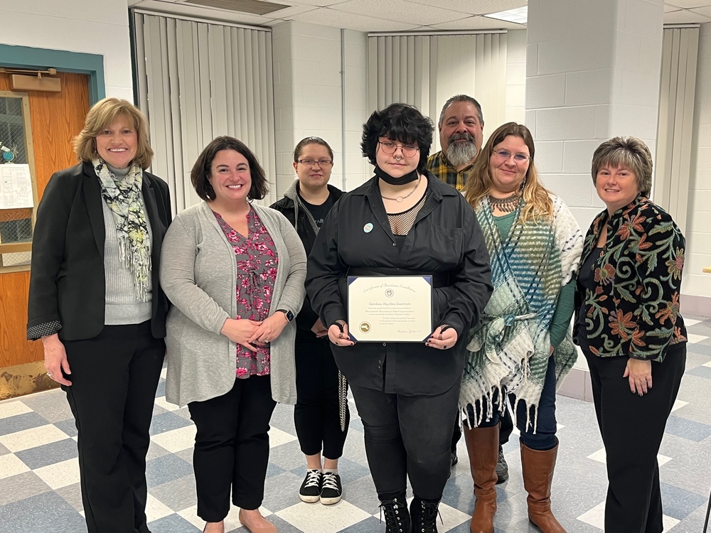 Evan-Quin May-Sims Goodermote, recipient of the Superintendent's Certificate of Academic Excellence, poses with family members, Superintendent Barbara Malkas, Drury Principal Stephanie Kopala and Mayor Jennifer Macksey.